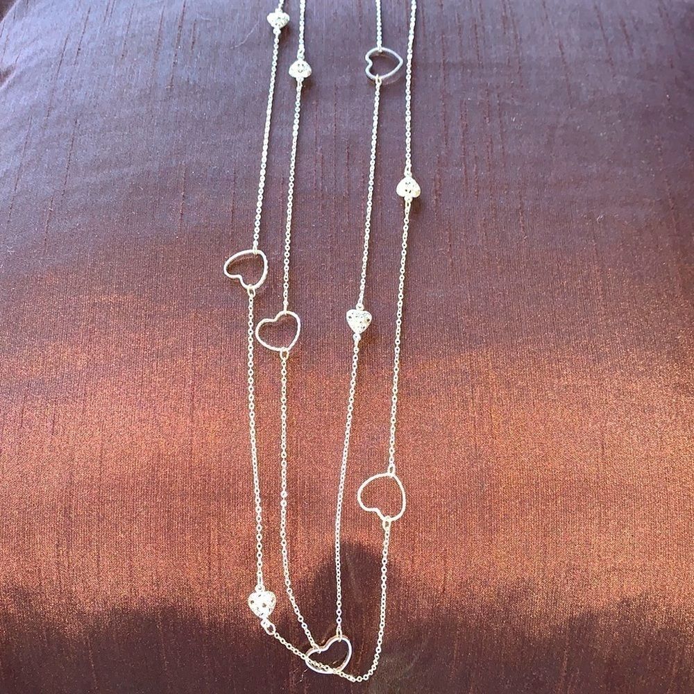 Silver tone rope heart charm necklace